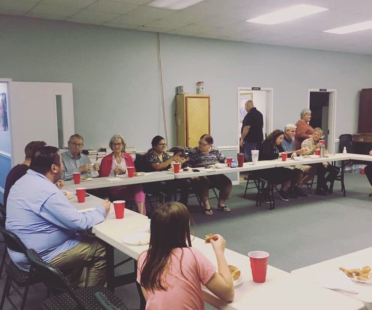 Church family gathered in fellowship and training